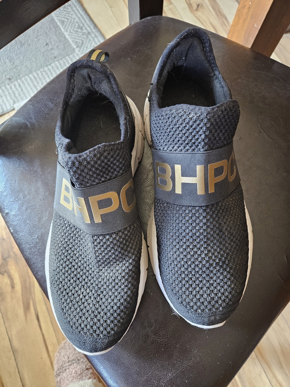 BHPC Mens Black Slip-On Knit Sneakers with Gold Logo Strap